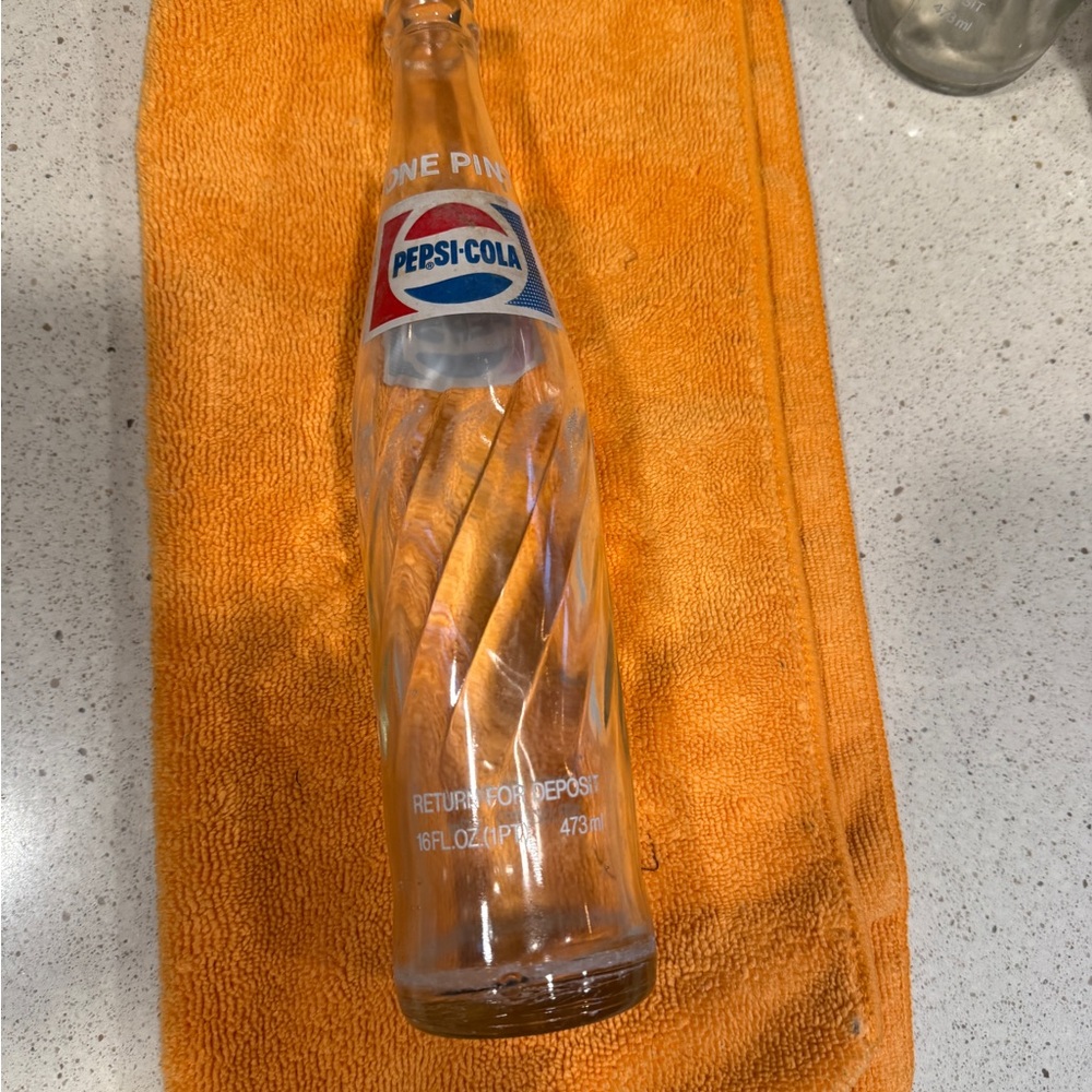 Vintage Pepsi Glass Bottle with Red, Blue, and White Logo 1980s